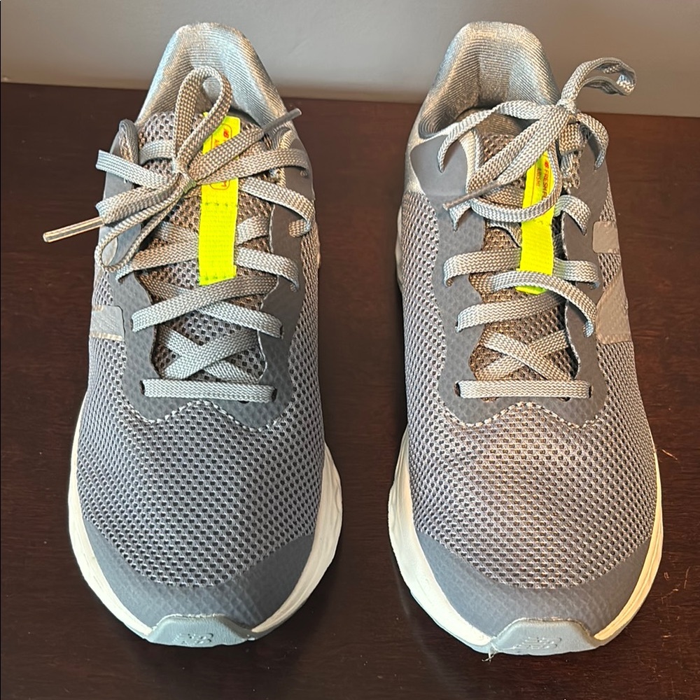 New Balance Gray Athletic Shoes with Yellow Accents